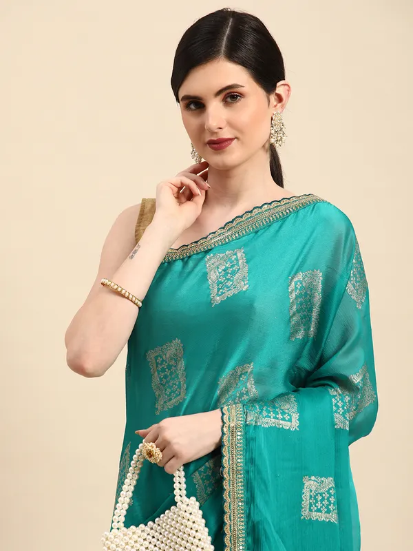 Indian_Women_Turquoise_Green_Chiffon_Embroidery_Border_with_foil_work