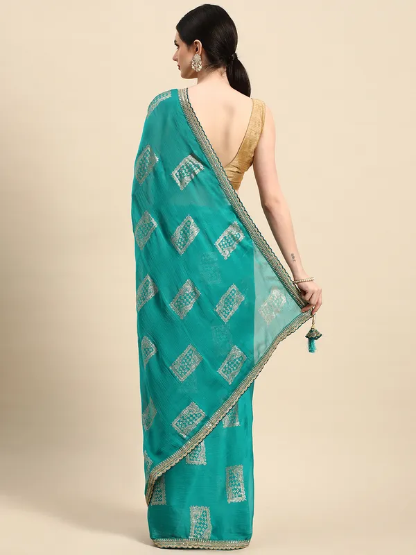 Indian_Women_Turquoise_Green_Chiffon_Embroidery_Border_with_foil_work