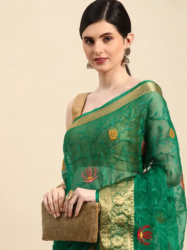 Indian_Women_Green_Orgenza_Fancy_border_with_Embroidery_work