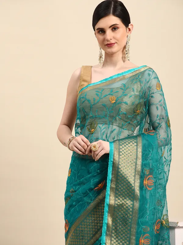 Indian_Women_Turquoise_Green_Orgenza_Fancy_border_with_Embroidery_work