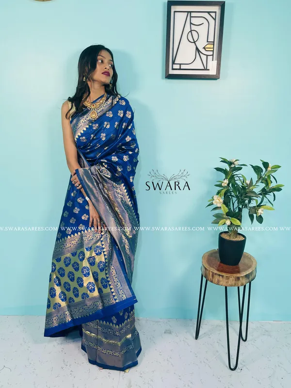 https://d1311wbk6unapo.cloudfront.net/NushopCatalogue/tr:f-webp,w-600,fo-auto/S7jsYFAo_8XVBK3WGM7_2023-05-15_1.jpg__Swara Saree