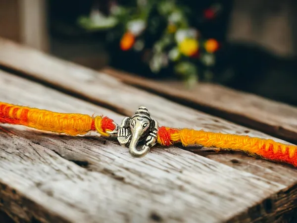 Silver_925_Sterling_Rakhi_For_Brother_Cute_Ganesha_Raksha_Bandhan_Pure_Cotton_For_Men,_Boys,_Kids_Rakhi_With_Roli_Chawal