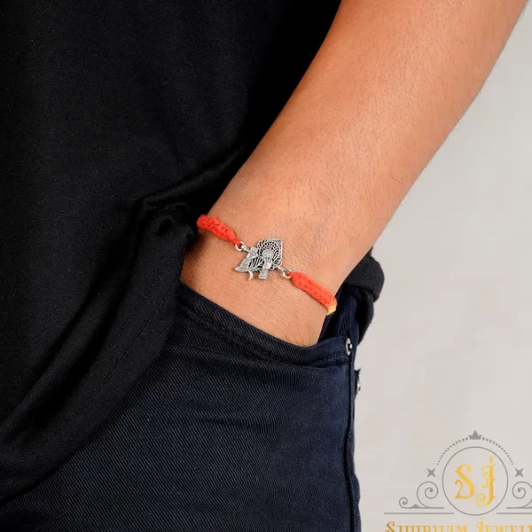 Silver_925_Sterling_Rakhi_For_Brother_God_Rakhi_Raksha_Bandhan_Pure_Cotton_For_Men_Boys_Kids_Rakhi_With_Roli_Chawal_(Krishna_Bansuri)