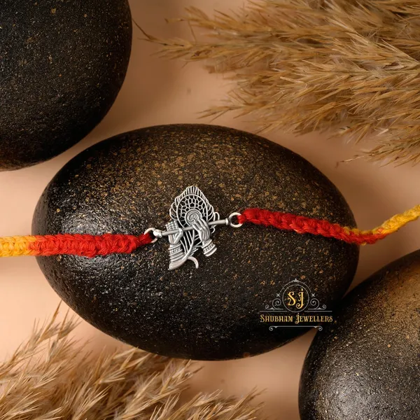 Silver_925_Sterling_Rakhi_For_Brother_God_Rakhi_Raksha_Bandhan_Pure_Cotton_For_Men_Boys_Kids_Rakhi_With_Roli_Chawal_(Krishna_Bansuri)