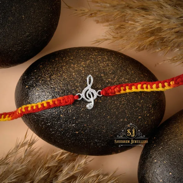 Silver_925_Sterling_Rakhi_For_Brother_Rakhi_Raksha_Bandhan_Pure_Cotton_For_Men_Boys_Kids_Rakhi_With_Roli_Chawal_(Musical_Note)