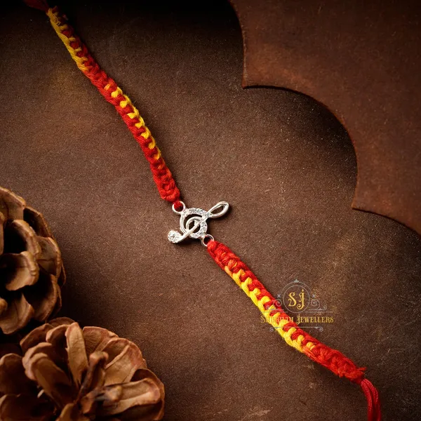 Silver_925_Sterling_Rakhi_For_Brother_Rakhi_Raksha_Bandhan_Pure_Cotton_For_Men_Boys_Kids_Rakhi_With_Roli_Chawal_(Musical_Note)