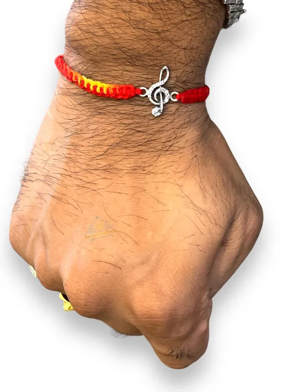 Silver_925_Sterling_Rakhi_For_Brother_Rakhi_Raksha_Bandhan_Pure_Cotton_For_Men_Boys_Kids_Rakhi_With_Roli_Chawal_(Musical_Note)