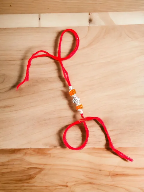 Silver_925_Sterling_Rakhi_For_Brother_Rudraksha_Rakhi_Raksha_Bandhan_Pure_Cotton_For_Men_Boys_Kids_Rakhi_With_Roli_Chawal_(Rudraksha_Om)