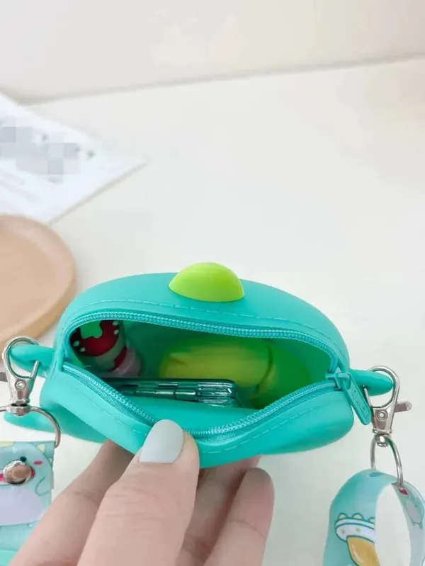 Cute_Mini_Dino_Silicone_Sling_Bag_With_Mirror,_Comb,_And_Key_Chain_-_Adorable_And_Stylish