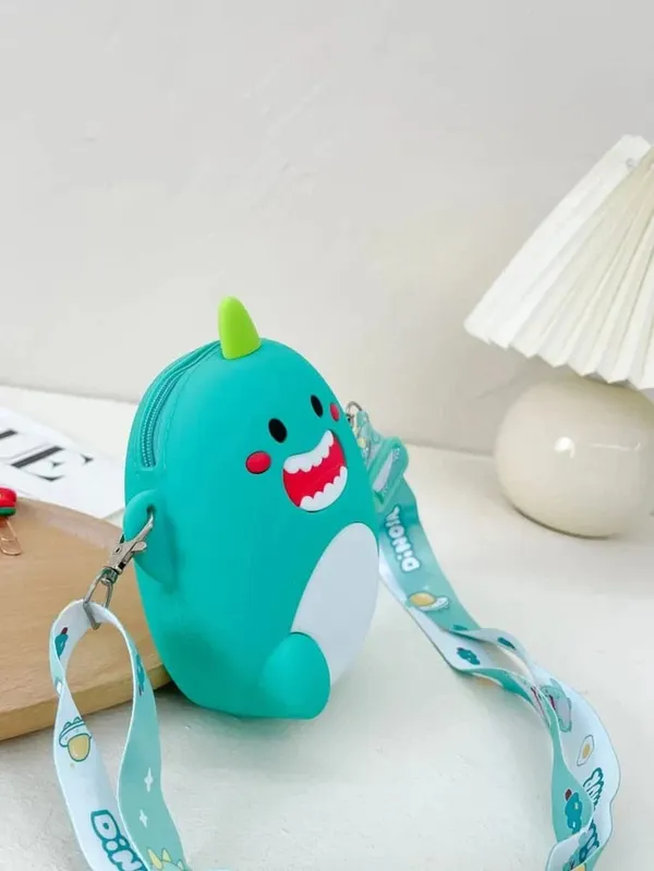 Cute_Mini_Dino_Silicone_Sling_Bag_With_Mirror,_Comb,_And_Key_Chain_-_Adorable_And_Stylish
