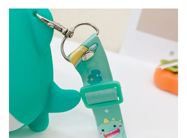 Cute_Mini_Dino_Silicone_Sling_Bag_With_Mirror,_Comb,_And_Key_Chain_-_Adorable_And_Stylish