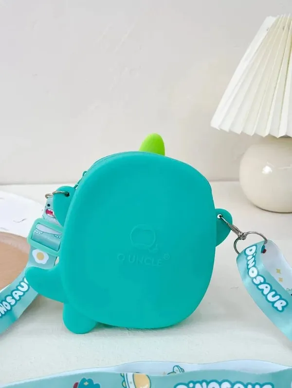 Cute_Mini_Dino_Silicone_Sling_Bag_With_Mirror,_Comb,_And_Key_Chain_-_Adorable_And_Stylish