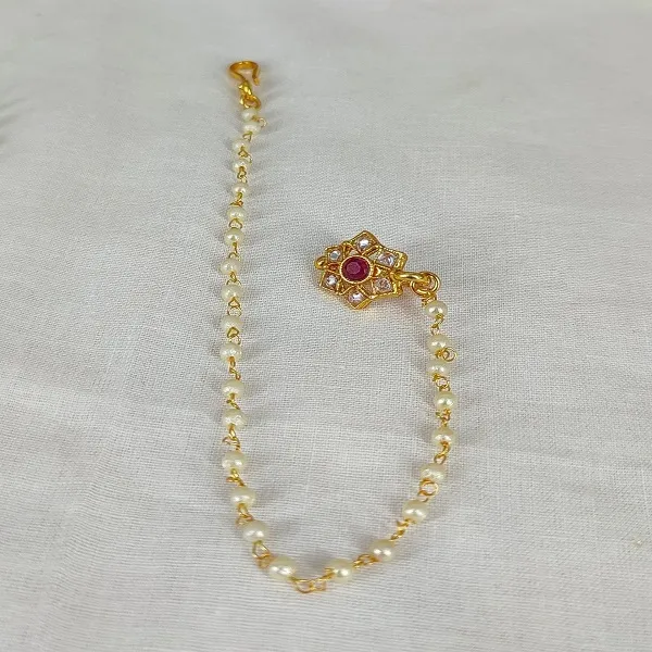 https://d1311wbk6unapo.cloudfront.net/NushopCatalogue/tr:f-webp,w-600,fo-auto/TRADITIONAL_COPPER_MATERIAL_KUNDAN_PEARL_NATH_FOR_WOMEN_._78S6N4NGV6_2022-08-29_1.jpeg__Padmawati Bangles   Private Limited