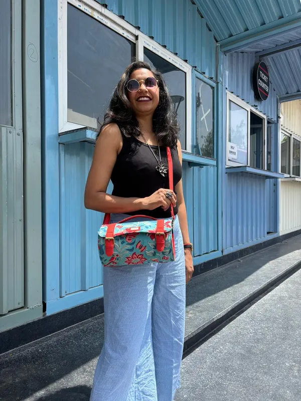 Orange_Teal_Floral_Handcrafted_Cotton_Printed_Cylinder_Sling_Bag_With_Matching_Handle