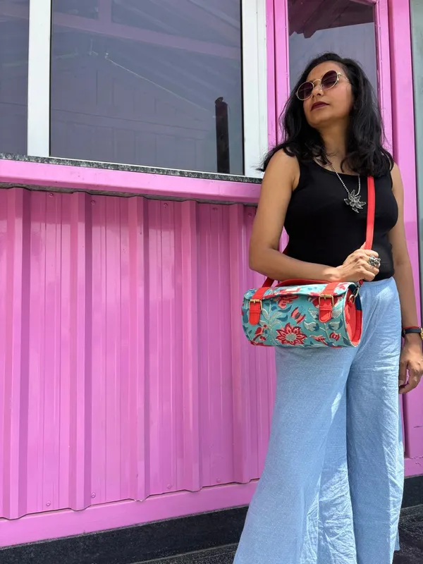 Orange_Teal_Floral_Handcrafted_Cotton_Printed_Cylinder_Sling_Bag_With_Matching_Handle
