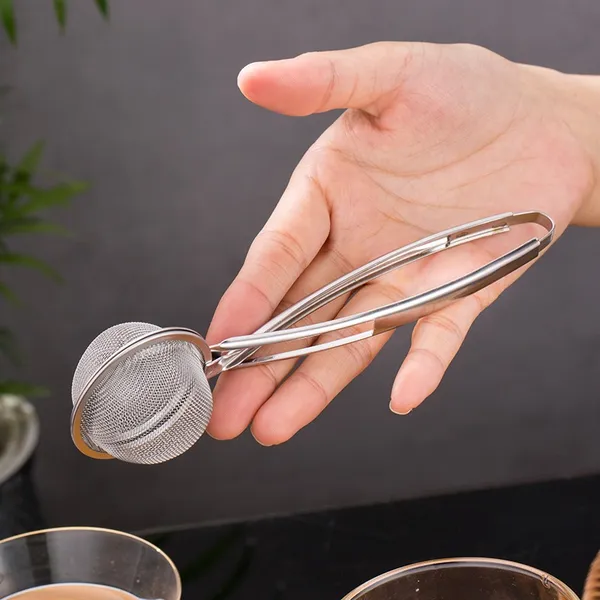 Tea_Infuser_Ball_Shape_with_Cross_Handle_,_Food_Grade_SS_material,_5cm