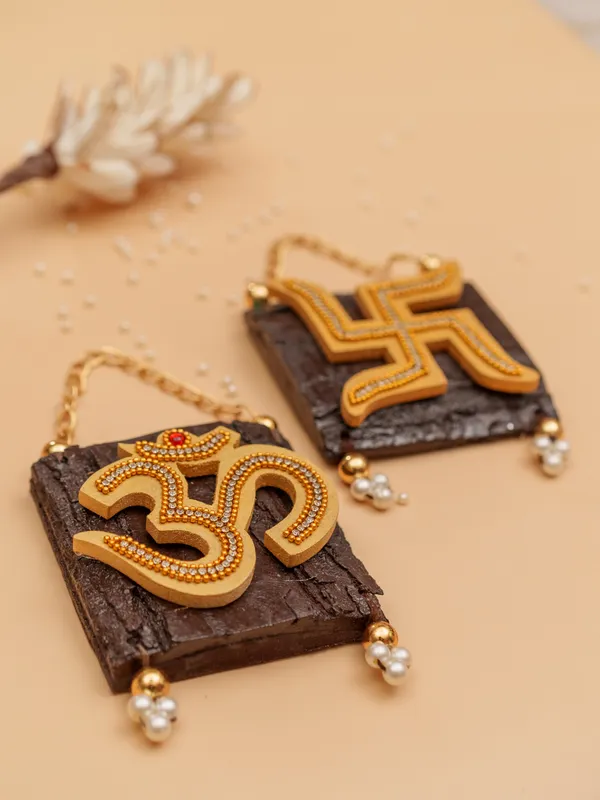 Golden_Om_&_Swastik_Log_Hanging_|_Auspicious_Wall_Accent_for_Gifting