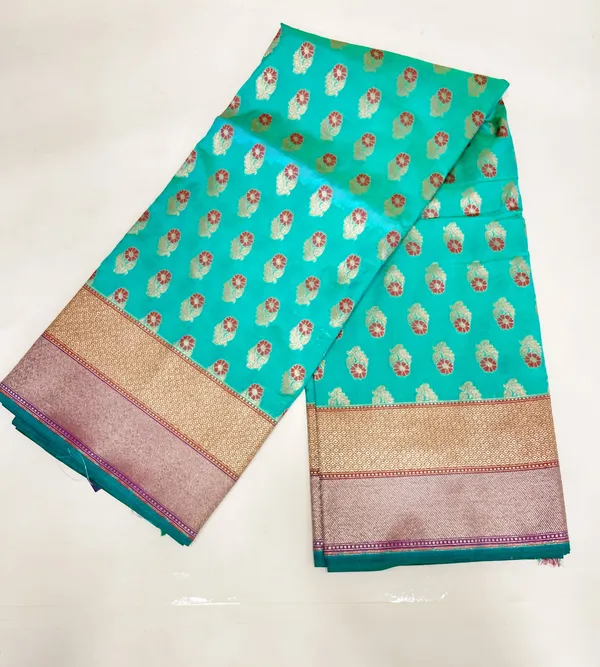 Humairah_Presents_Sea_Green_Katan_Silk_Floral_Zari_Mina_Booti_with_Banarasi_2D_Zari_Border_and_Floral_Pallu_with_Sea_Green_Blouse