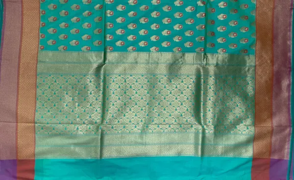 Humairah_Presents_Sea_Green_Katan_Silk_Floral_Zari_Mina_Booti_with_Banarasi_2D_Zari_Border_and_Floral_Pallu_with_Sea_Green_Blouse