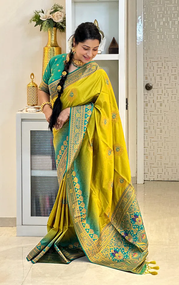 Jenni_Yellow_–_Wedding_Special_|_Premium_Soft_Banarasi_Silk_Saree_with_Weaving_Pattern,_Pallu_&_Border,_Weaving_Blouse_with_Tassels