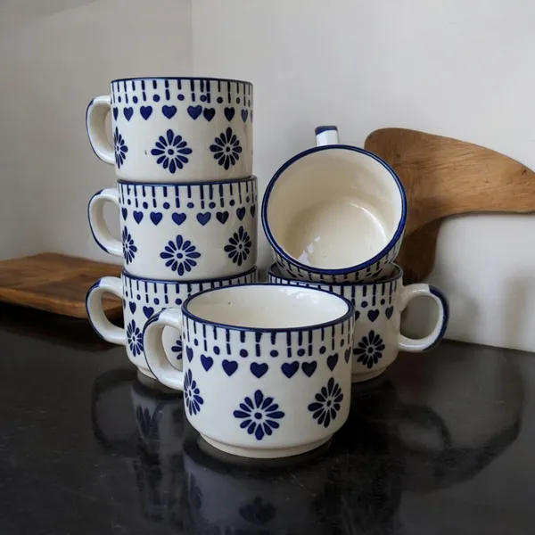 https://d1311wbk6unapo.cloudfront.net/NushopCatalogue/tr:f-webp,w-600,fo-auto/Vintage_Blue_and_White_Ceramic_Mug_Set__Set_of_6__E786A9SEI9_2024-07-14_1.png__Madarks