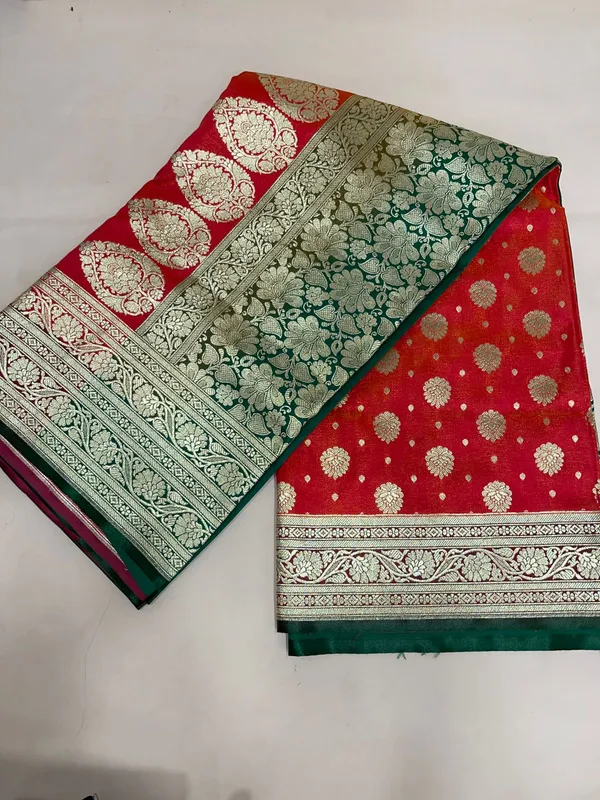 Humairah_Presents_Orange_Satin_Silk_Zari_Booti_and_Contrast_Green_2D_Zari_Border_and_Heavy_Floral_Jaal_Pallu_Banarasi_Saree_with_Green_Blouse