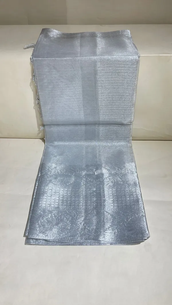 Humairah_Presents_Silver_Supernet_Banarasi_Tissue_Zari_Stripe_Skirt_Floral_Zari_Border_and_Contrast_Gold_Pallu_with_Silver_Blouse_Banarasi_Saree