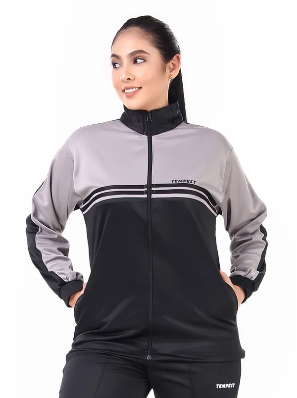 https://d1311wbk6unapo.cloudfront.net/NushopCatalogue/tr:f-webp,w-600,fo-auto/WomenTrackJacket_PolyesterLightGrey_1718708111364_9xy4mb1b87v1o31.jpg__TEMPEST