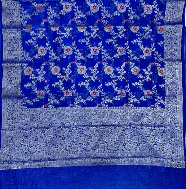Humairah_Presents_Blue_Semi_Georgette_Tilfi_Mina_Floral_Zari_Jaal_with_Banarasi_Floral_Pallu_and_Blue_Blouse