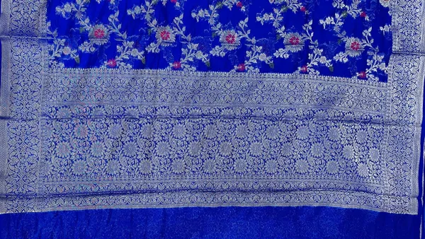 Humairah_Presents_Blue_Semi_Georgette_Tilfi_Mina_Floral_Zari_Jaal_with_Banarasi_Floral_Pallu_and_Blue_Blouse
