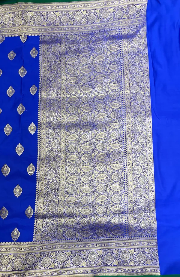 Humairah_Presents_Royal_Blue_Katan_Silk_Silver_Zari_Booti_and_Floral_Zari_Jaal_Border_and_Heavy_Pallu_Banarasi_saree_with_Blue_Blouse