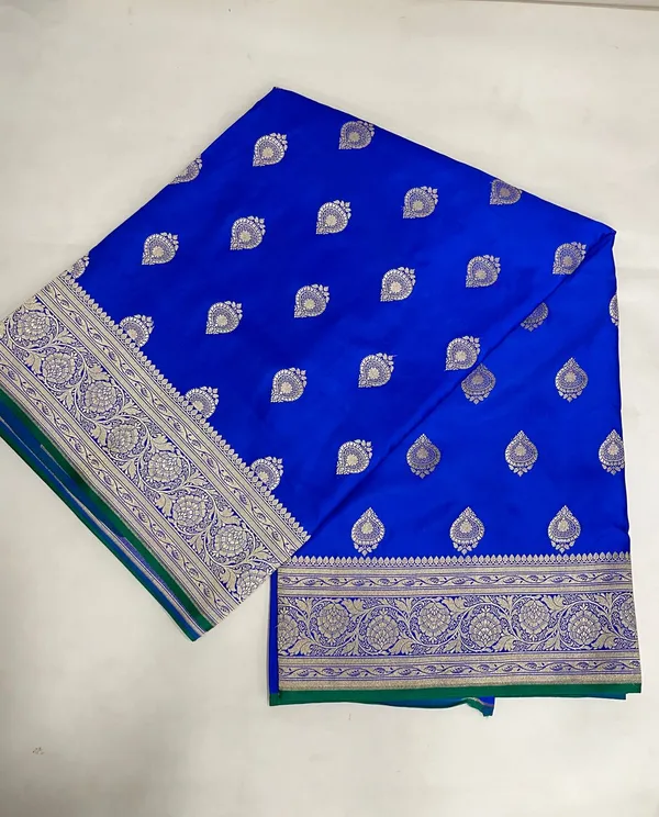 Humairah_Presents_Royal_Blue_Katan_Silk_Silver_Zari_Booti_and_Floral_Zari_Jaal_Border_and_Heavy_Pallu_Banarasi_saree_with_Blue_Blouse