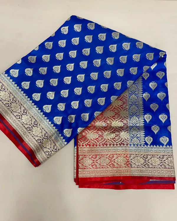 Humairah_Presents_Blue_Satin_Silk_Silver_Zari_Pan_Booti_and_Contrast_Red_Zari_Border_and_Heavy_Silver_Zari_Floral_Anchal_Banarasi_Saree_with_Red_Blouse