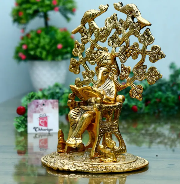 Gold_Lord_Ganesha_Reading_Ramayana_Statue_Hindu_Ganesh_Ganpati_Sitting_On_Chair_Under_Tree_Idol_Sculpture_For_Home_Office_And_Gifts_Decor_Decorative_Showpiece