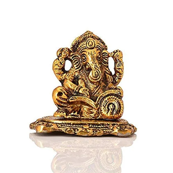 Metal_Ganpati_idol_with_Reading_Book_Decorative_Showpiece_-_8_Cm_(Metal_Color_Gold)
