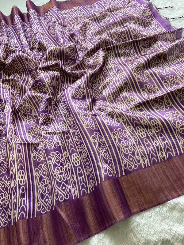 Manjusha_Purple_–_Treasured_Navratri_Special_|_Soft_Tussar_Silk_Saree_with_Print,_Border_&_Contrast_Print_Blouse_with_Tassels
