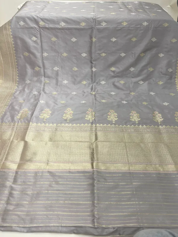 Humairah_Pure_Handwoven__Grey_Katan_Silk_Kadhwa_Gold_&_Silver_Swastik_Booti_with_Kadhwa_Zari_Border_and_Grey_Stripe_Blouse