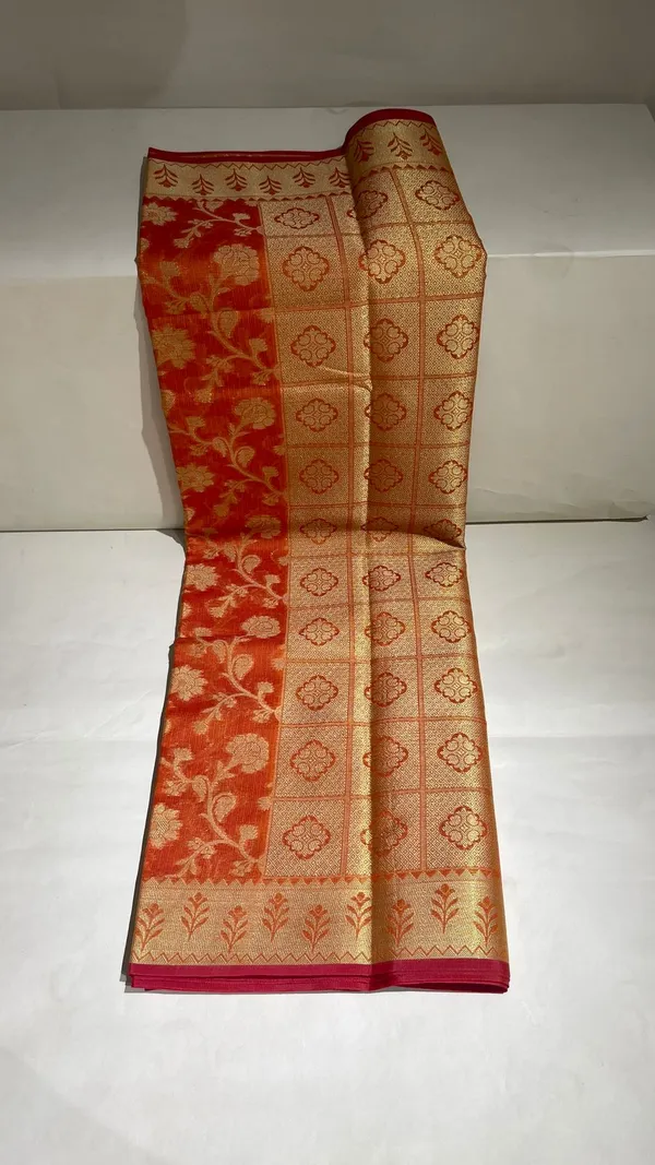 Humairah_Presents_Orange_Tissue_Golden_Floral_Zari_Jaal_with_Checkered_Pallu_and_Orange_Blouse