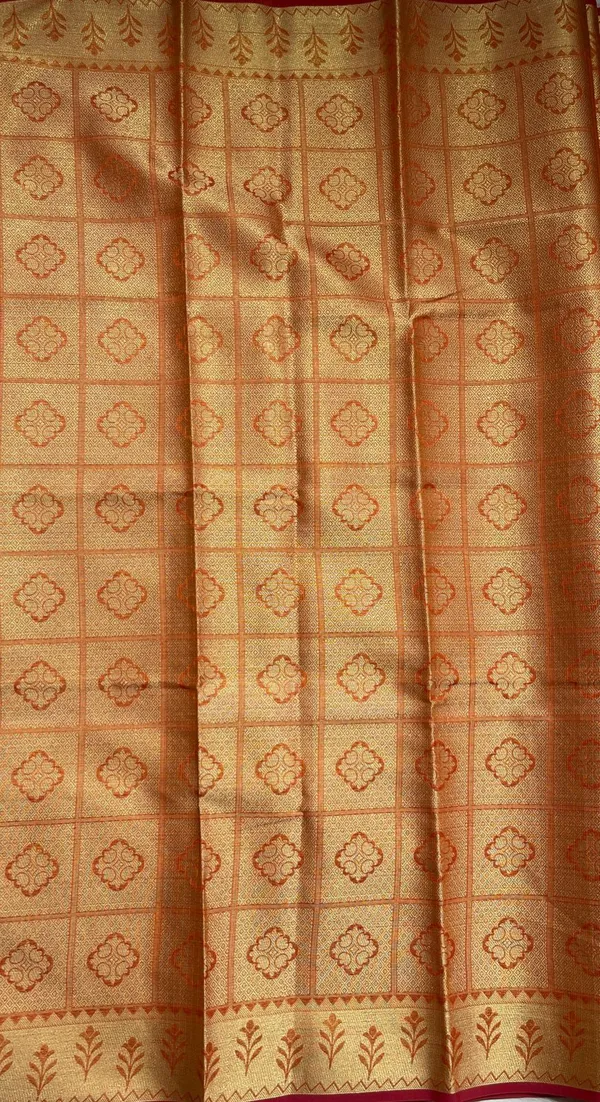 Humairah_Presents_Orange_Tissue_Golden_Floral_Zari_Jaal_with_Checkered_Pallu_and_Orange_Blouse