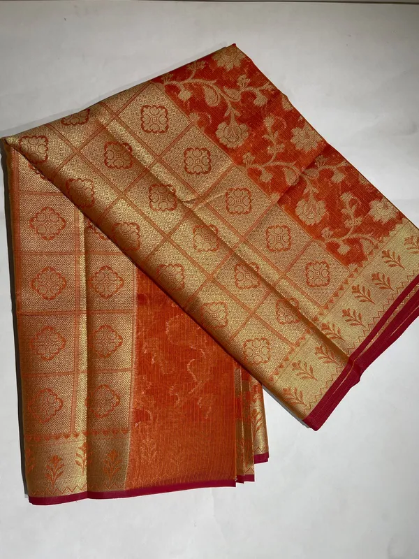 Humairah_Presents_Orange_Tissue_Golden_Floral_Zari_Jaal_with_Checkered_Pallu_and_Orange_Blouse