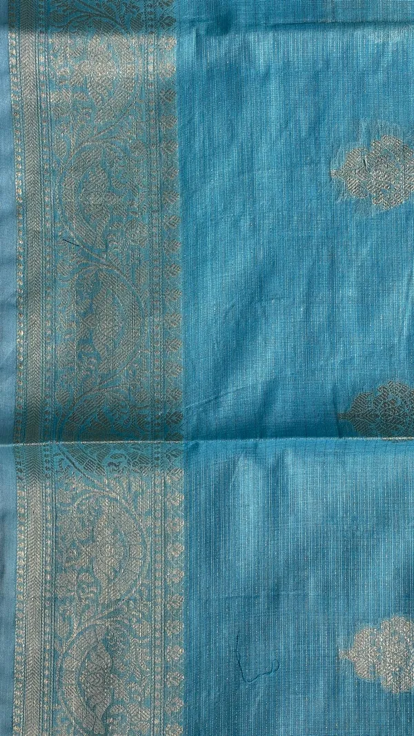 Humairah_Presents_Sky_Blue_Cotton_Masrise_Floral_Silver_Zari_Booti_with_Self_Silver_Zari_Border_and_Sky_Blue_Blouse