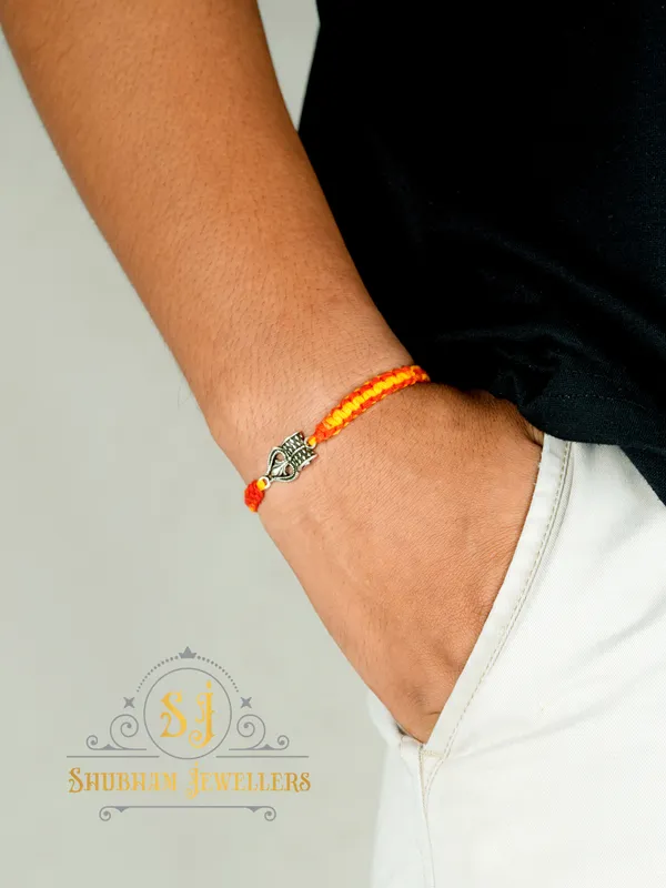 Silver_925_Sterling_Rakhi_For_Brother_God_Rakhi_Raksha_Bandhan_Pure_Cotton_For_Men_Boys_Kids_Rakhi_With_Roli_Chawal_(Trishool_With_Dmaru)