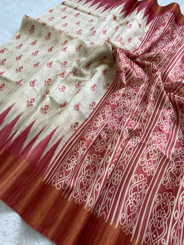 Soft_Tussar_Silk_sarees_with_Beautiful_Print_With_Attractive_Border_And_Contrast_Print_Blouse_With_Tassels