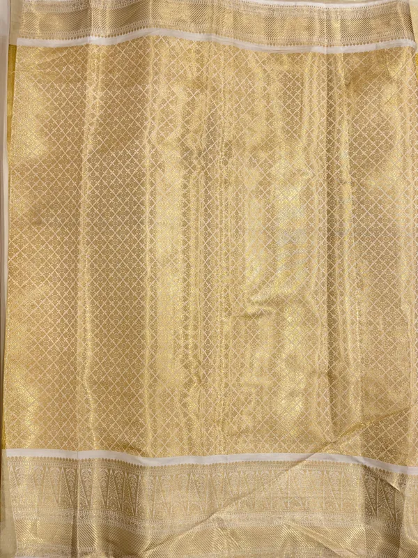 Humairah_Presents_Gold_Tissue_Alfi_Silver_Zari_Booti_with_Contrast_Off_White_Pallu_Saree_with_Off_White_Blouse
