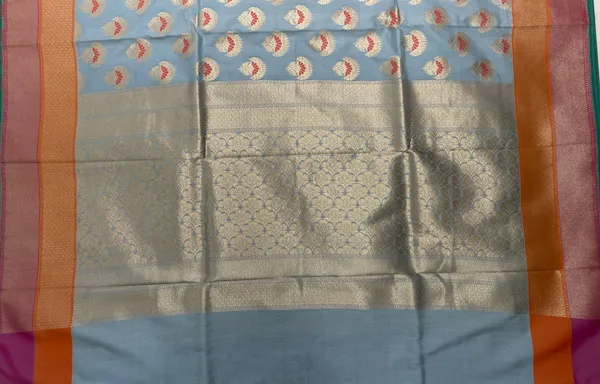 Humairah_Presents_Grey_Katan_Silk_Floral_Zari_Minakari_Booti_with_Banarasi_2D_Zari_Border_and_Floral_Pallu_with_Light_Grey_Blouse