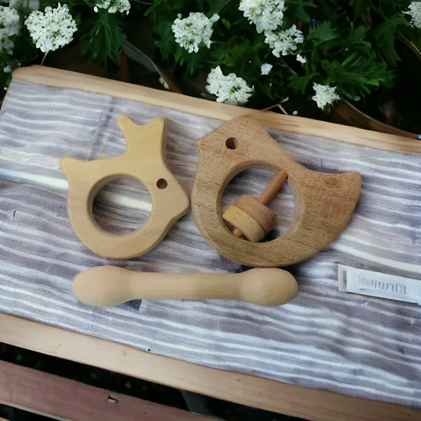 Beautiful_Dove_Rattle_&_Dumbbell_&_Rabbit_Shaped_Teethers_made_from_Pure_Neem_Wood