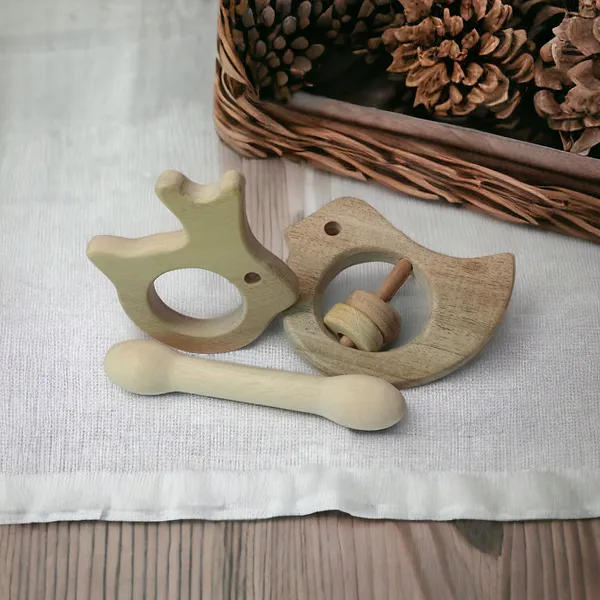 Beautiful_Dove_Rattle_&_Dumbbell_&_Rabbit_Shaped_Teethers_made_from_Pure_Neem_Wood