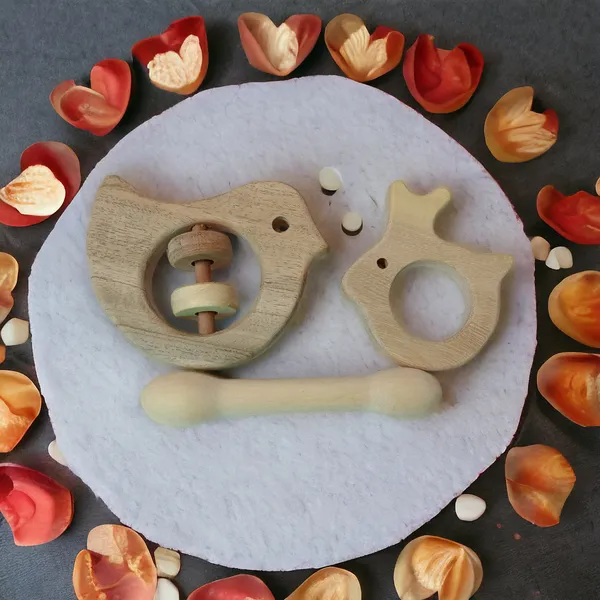 Beautiful_Dove_Rattle_&_Dumbbell_&_Rabbit_Shaped_Teethers_made_from_Pure_Neem_Wood