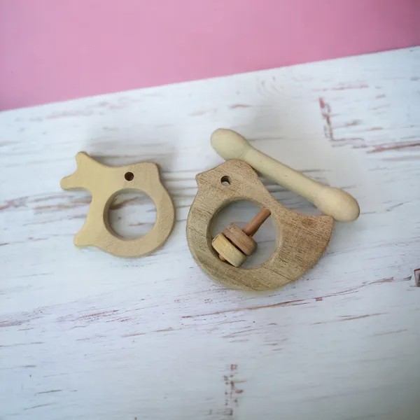 Beautiful_Dove_Rattle_&_Dumbbell_&_Rabbit_Shaped_Teethers_made_from_Pure_Neem_Wood