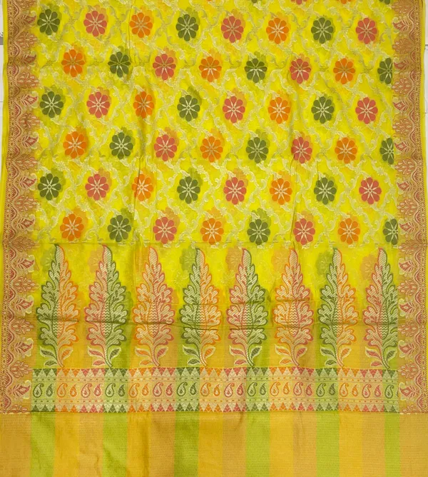 Humairah_Presents_Yellow_Semi_Georgette_Alfi_Mina_Floral_Zari_Jaal_Minakari_Zari_Border_with_Banarasi_Floral_Boota_Pallu_and_Yellow_Multi_Stripe_Blouse